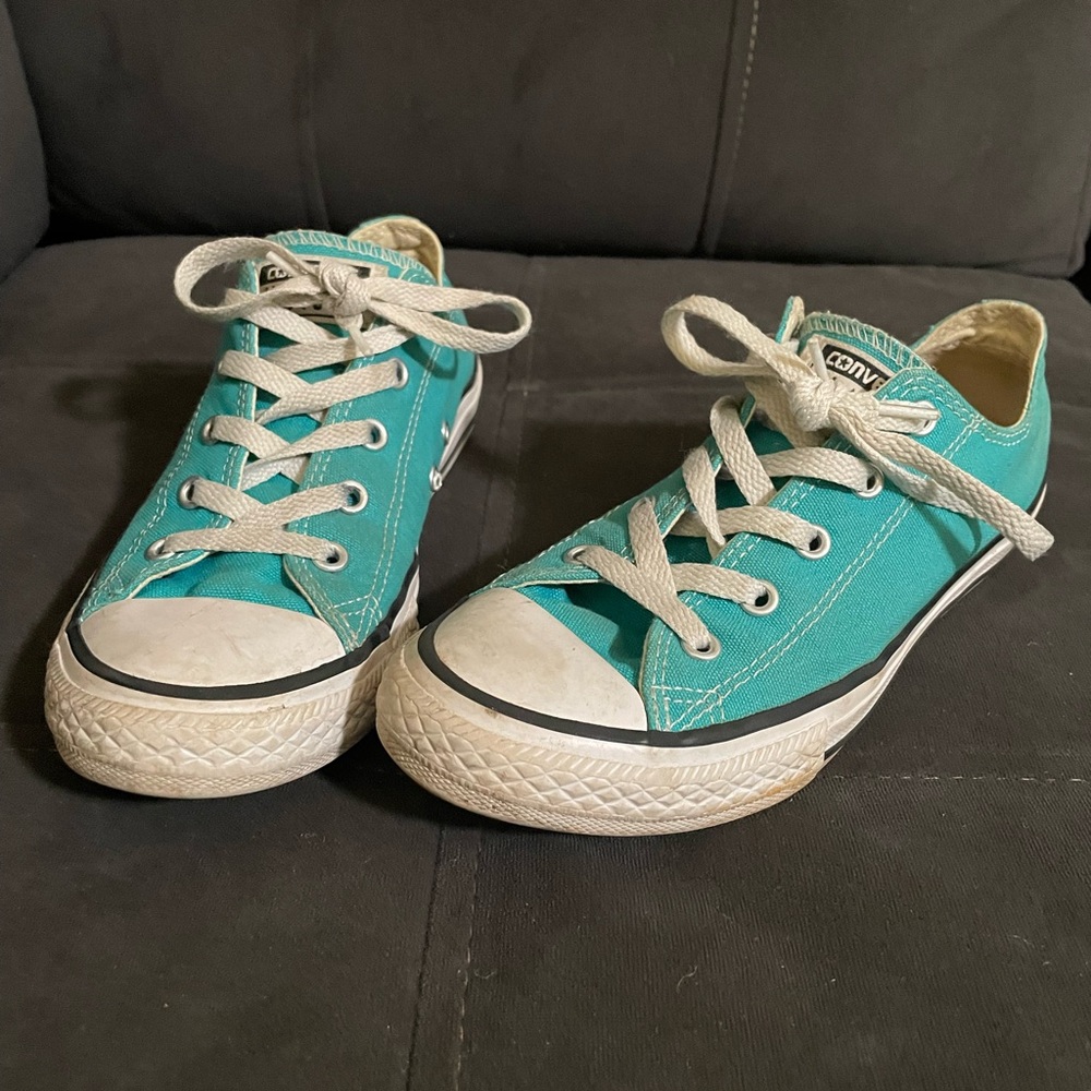 Teal Converse low tops